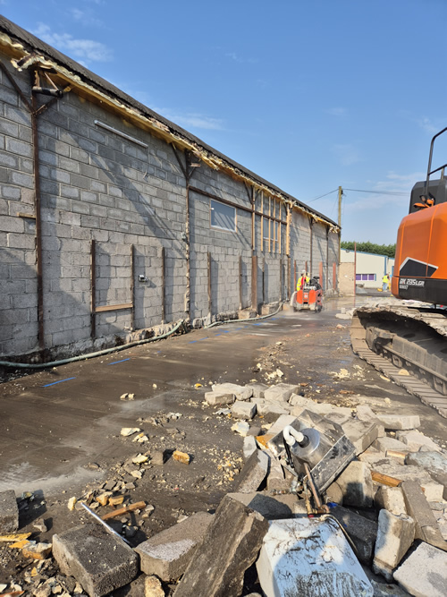 Bens Demolition Division photo Wet drop assy roof sheets and take down building